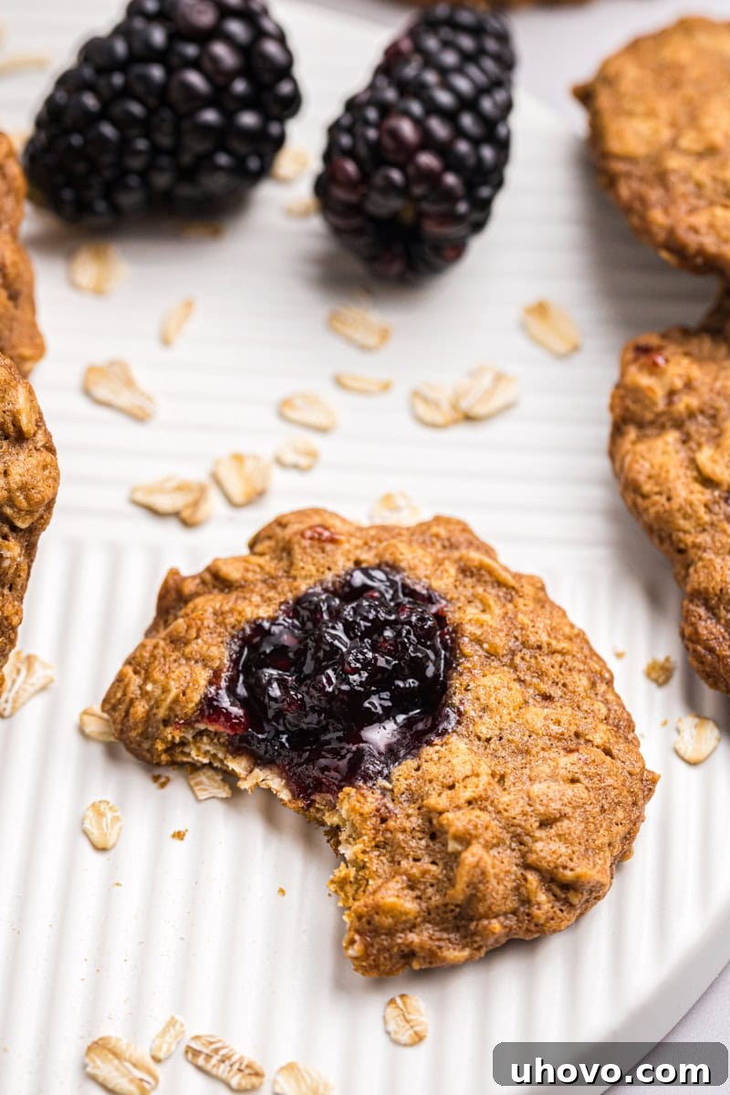 an oatmeal thumbprint cookie with a bite missing