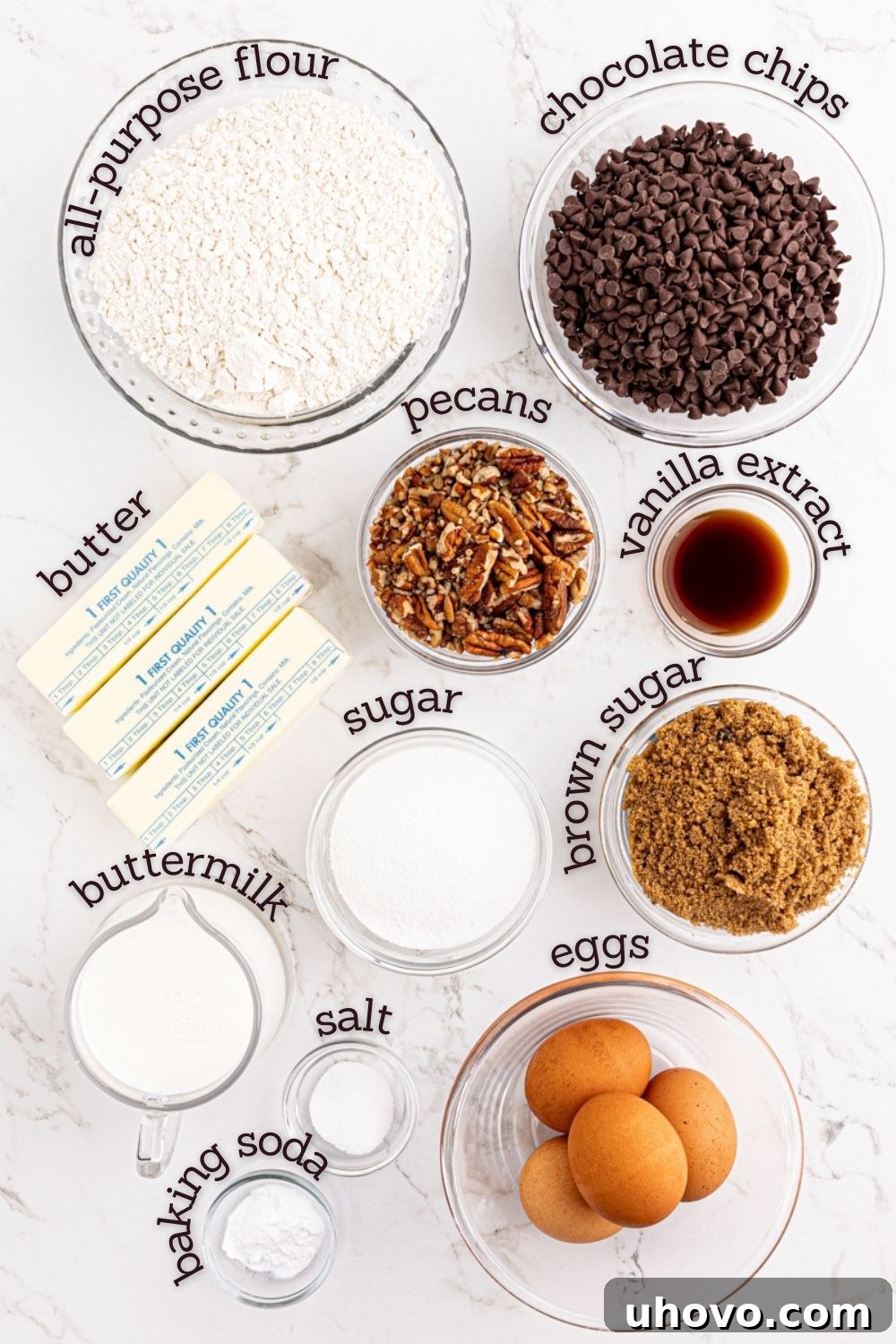 An overhead shot showcasing all the essential ingredients laid out for baking the chocolate chip Bundt cake, ready for mixing.