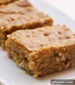 Brown Sugar Cashew Blondies on a small white tray, ready to be enjoyed