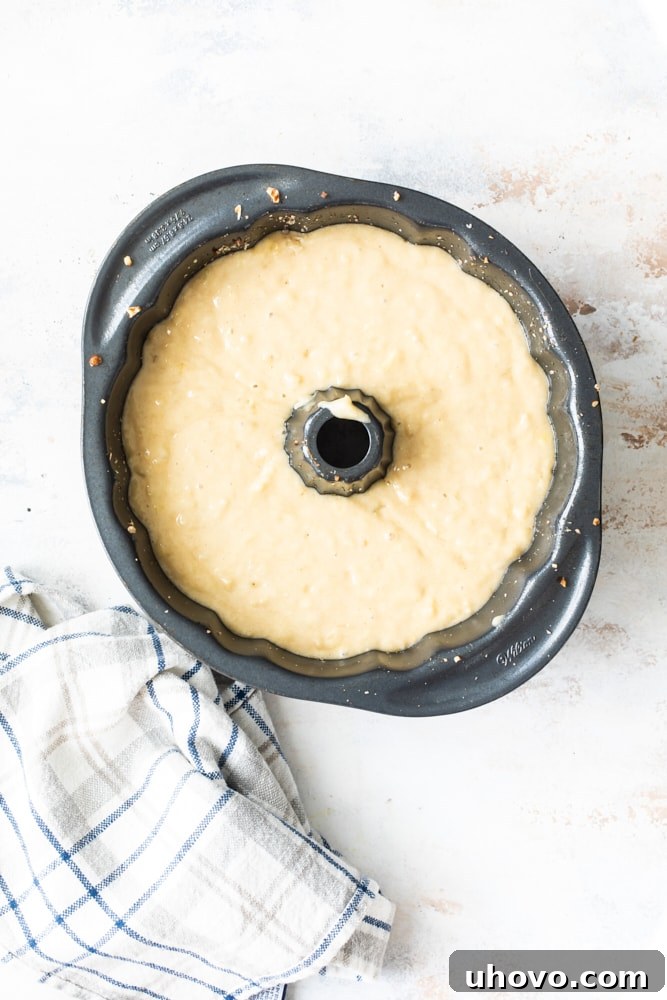 Overhead view of cake batter in Bundt pan