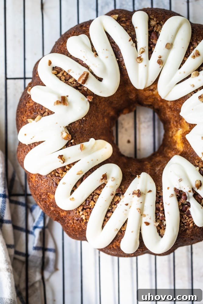 Overhead view of whole hummingbird Bundt cake on wire rack