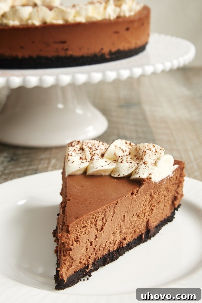 Decadent slice of Chocolate Kahlua Cheesecake on a elegant white plate