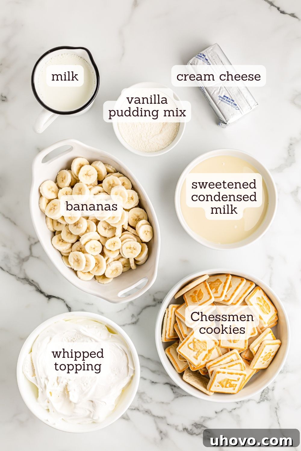 Overhead view of all ingredients for banana pudding laid out on a clean surface.