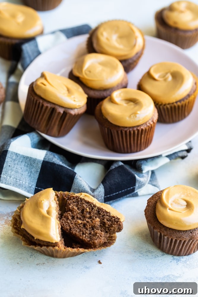 Mexican Chocolate Cupcakes on a white plate and a light-colored surface