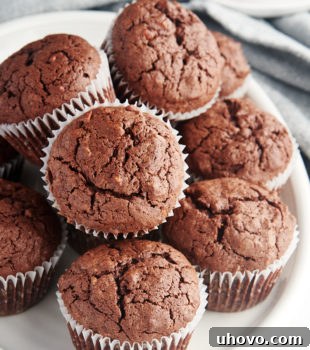 Brownie cupcakes stacked on plate
