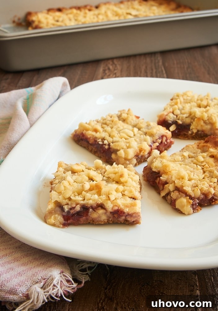 Strawberry Magic Bars: A delightful twist on the classic dessert, featuring sweet strawberry preserves, white chocolate, and hazelnuts.