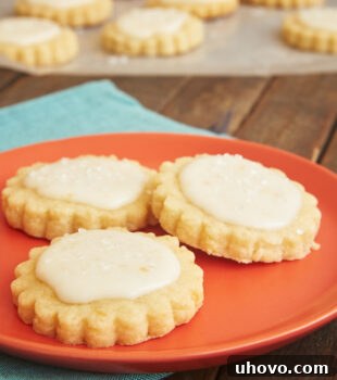 Peach Shortbread Cookies on an orange plate