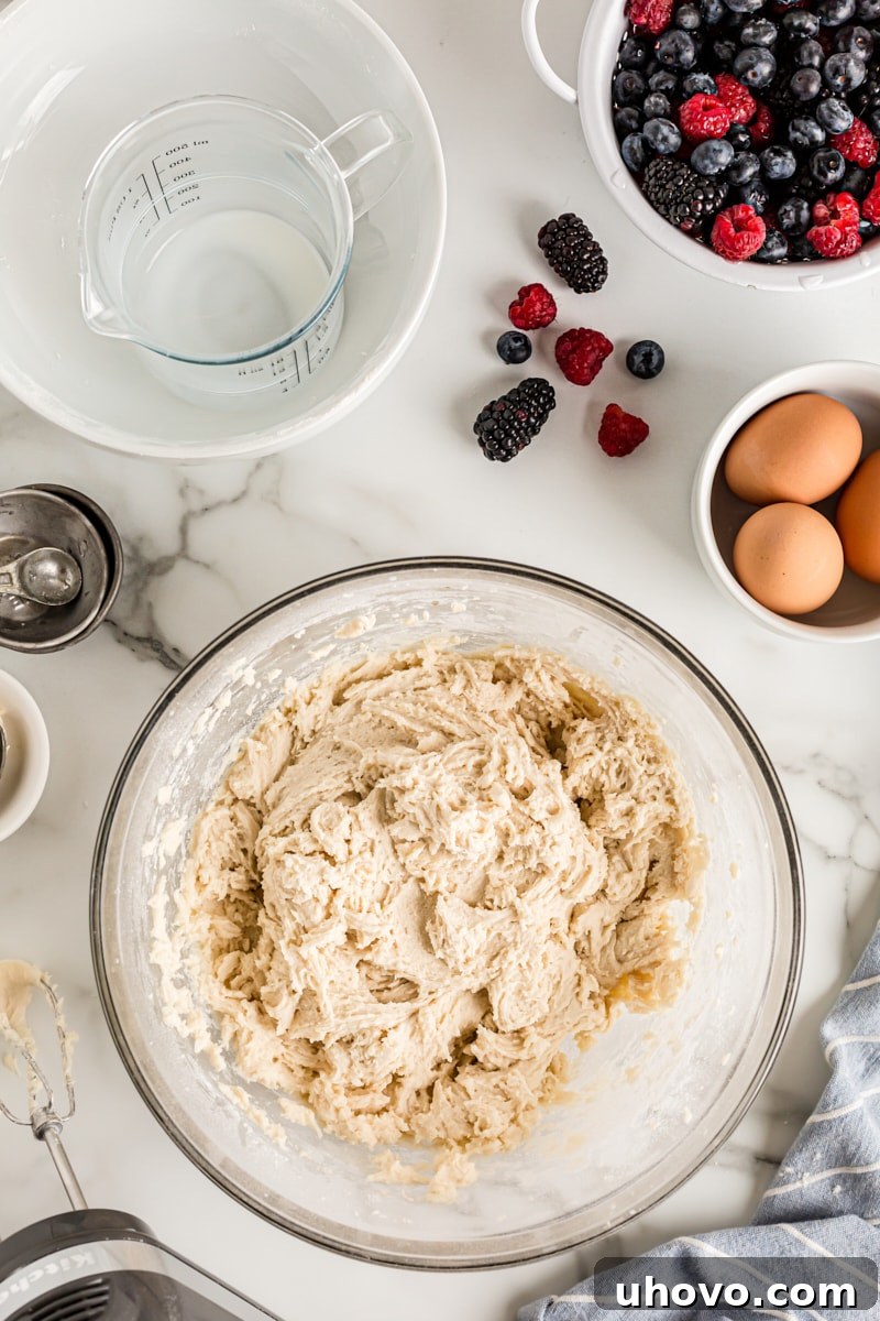 Overhead view of cake batter in mixing bowl