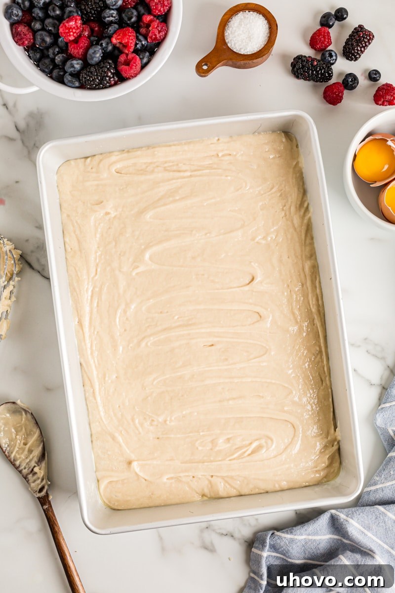 Overhead view of cake batter in pan