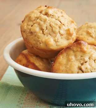 Toasted coconut adds lots of flavor to these sweet, hearty Coconut Cream Cheese Oat Muffins.