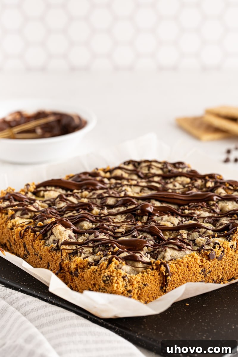 Chocolate chip cookie dough cheesecake bars before cutting