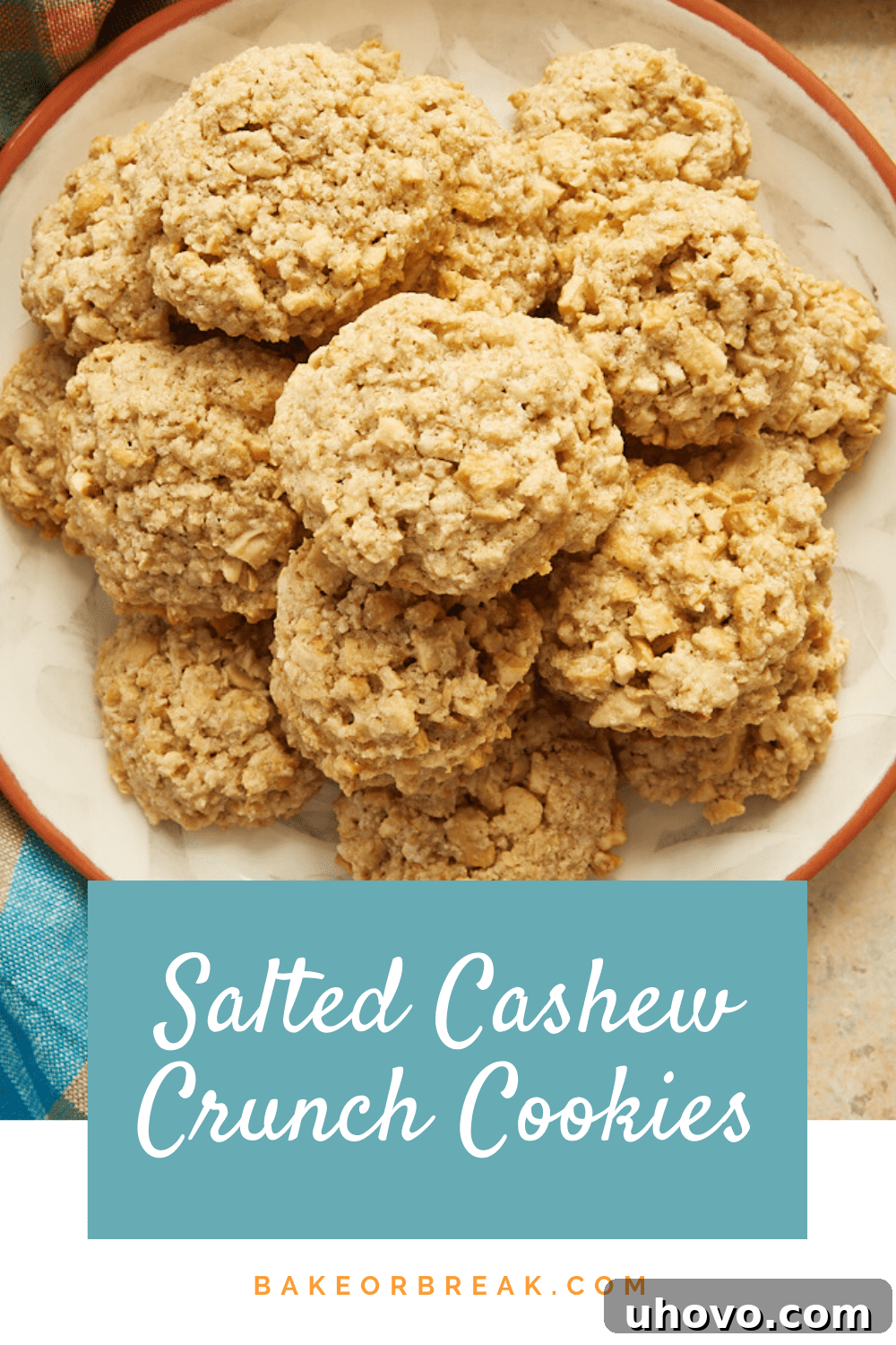 A perfectly baked Salted Cashew Crunch Cookie, golden brown with visible cashew pieces, ready for a delightful bite.