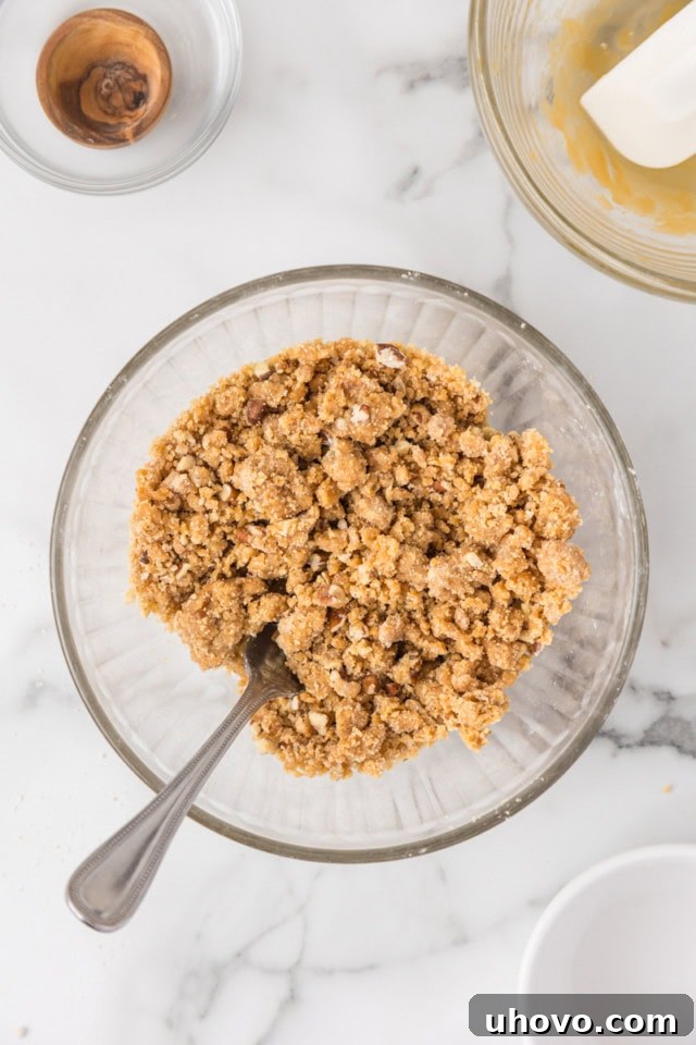 overhead view of caramel crumb topping in a glass bowl