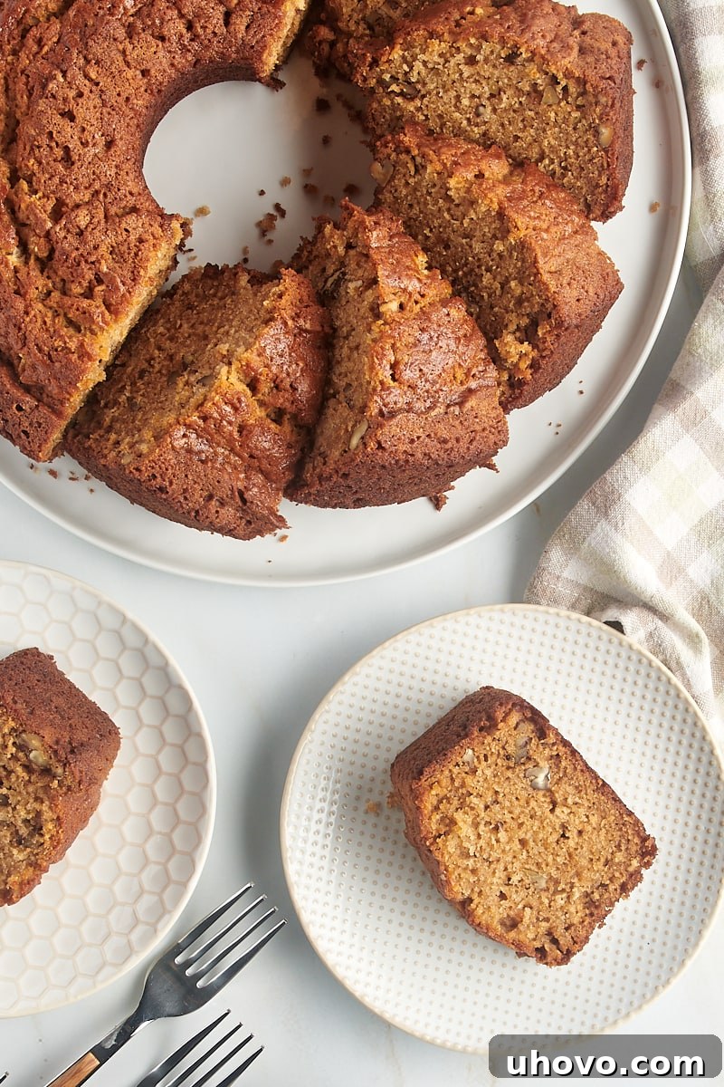 Overhead view of pear bread on plates and round serving tray