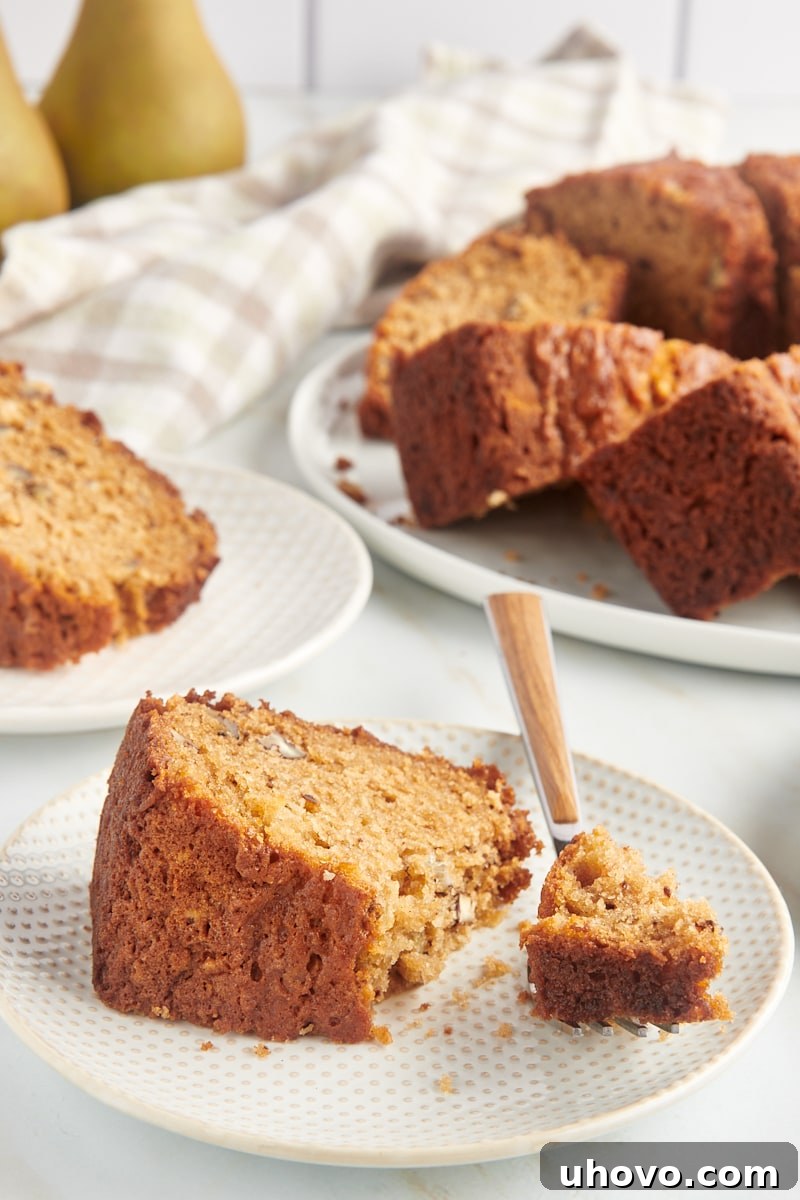 Slices of pear bread on two plates and platter