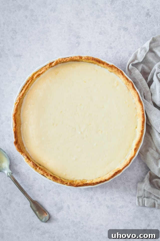 overhead view of pie crust filled with pastry cream