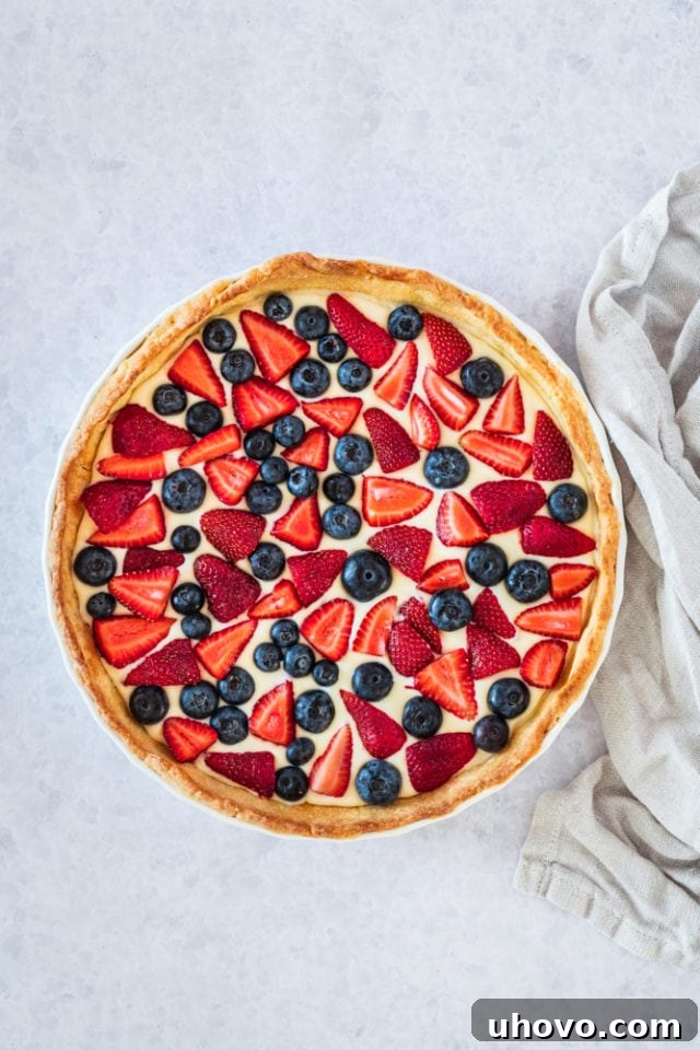 overhead view of Fresh Berry Tart in a white pie plate