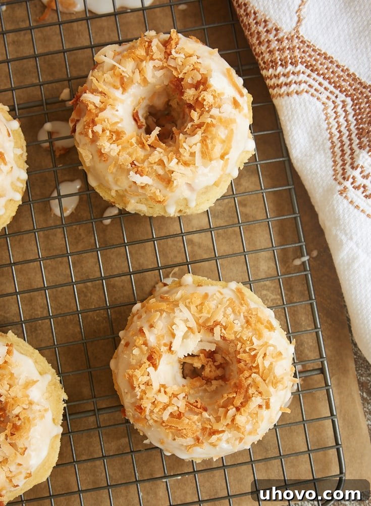 Toasted Coconut Cake Doughnuts on a wire rack