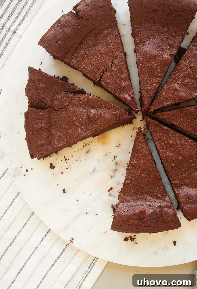 This Easy Chocolate Torte recipe is the perfect addition to the recipe boxes of all chocolate lovers. It is full of rich, fudgy, decadent, dark chocolate flavor!