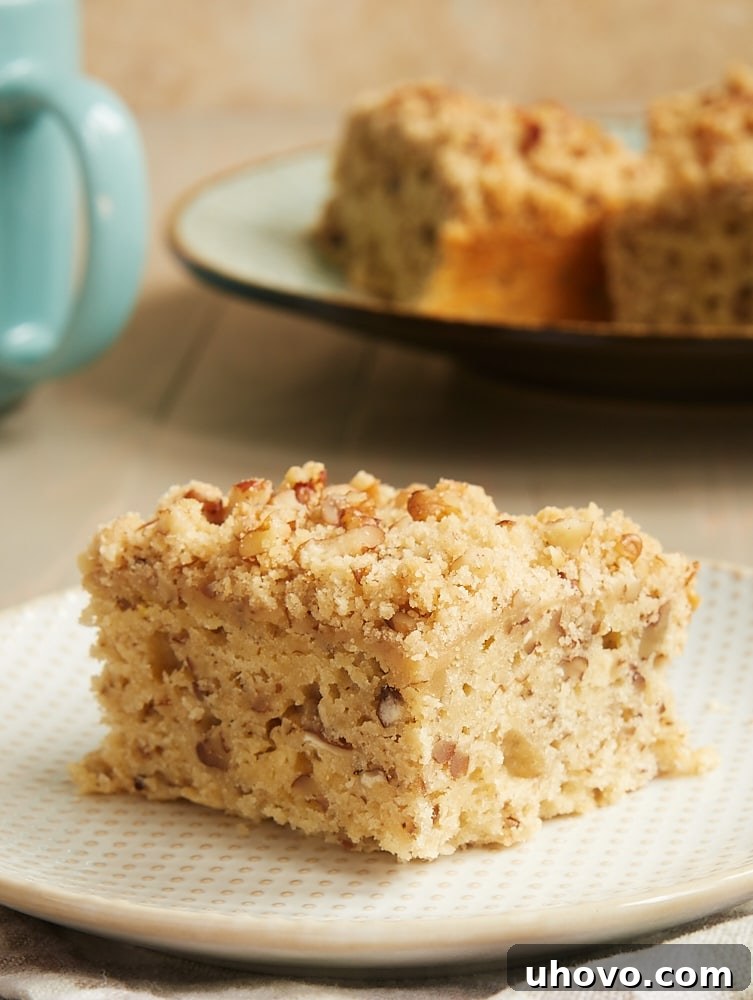 Brown Sugar Pecan Coffee Cake with a golden-brown crumb, a perfect accompaniment to coffee or tea