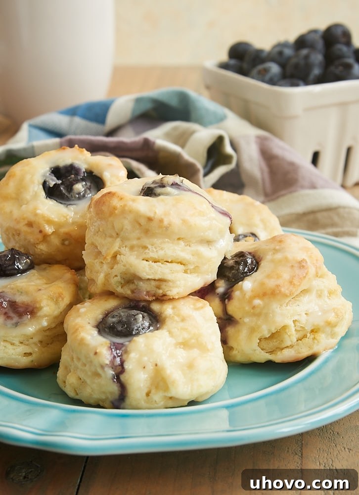 Glazed Blueberry Cream Cheese Biscuits stack