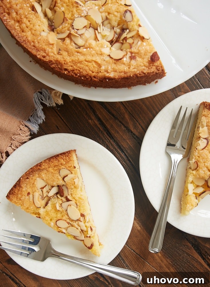 Multiple slices of Lemon Almond Butter Cake, displaying the harmonious blend of lemon curd and almond crust, irresistible for a gathering.