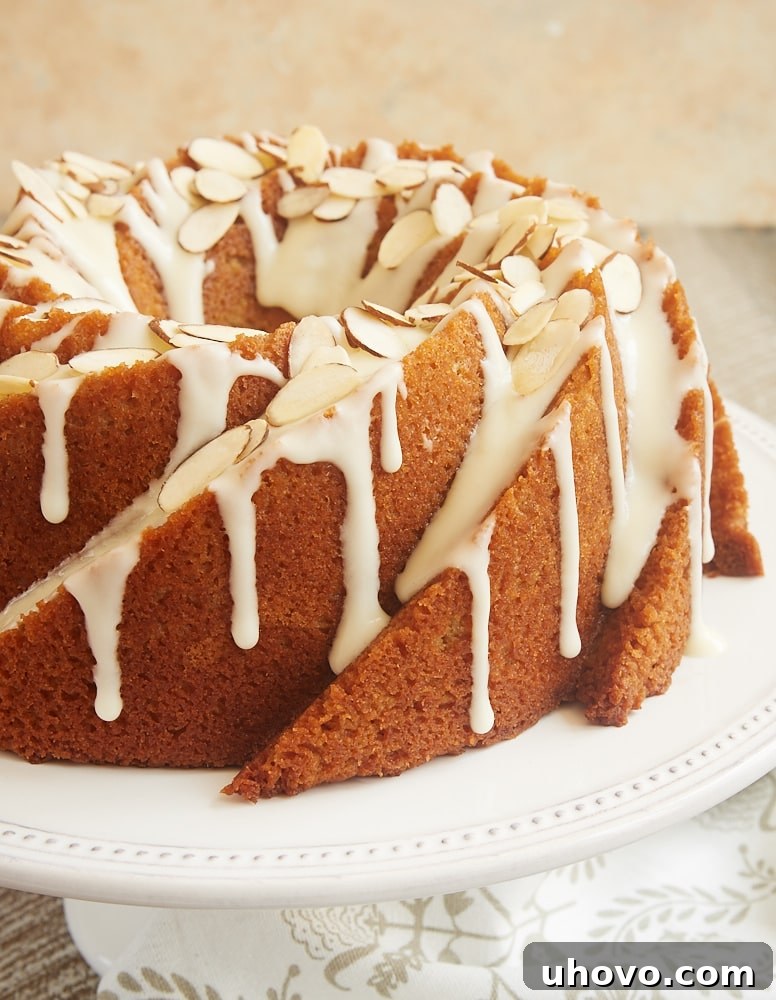Beautifully glazed Amaretto Almond Bundt Cake ready to be served