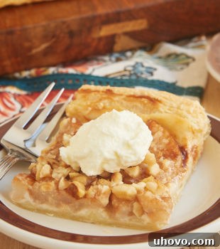 Cream Cheese-Filled Pear Tart is that perfect combination of easy to make and wonderfully delicious. A go-to recipe when I need a simple dessert that's sure to please! - Bake or Break