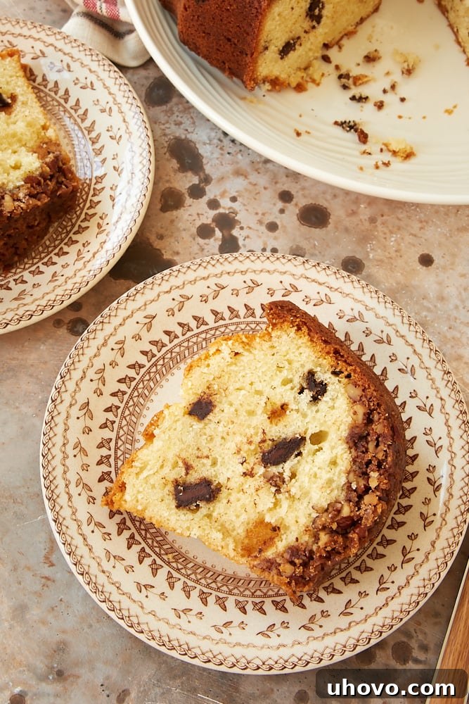 Slice of Chocolate Chunk Pecan Crunch Bundt Cake on plate