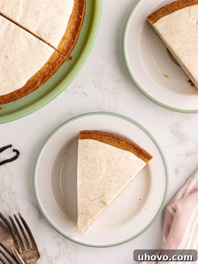 Slice of Vanilla Bean Cake with Browned Butter Icing, showing off vanilla specks