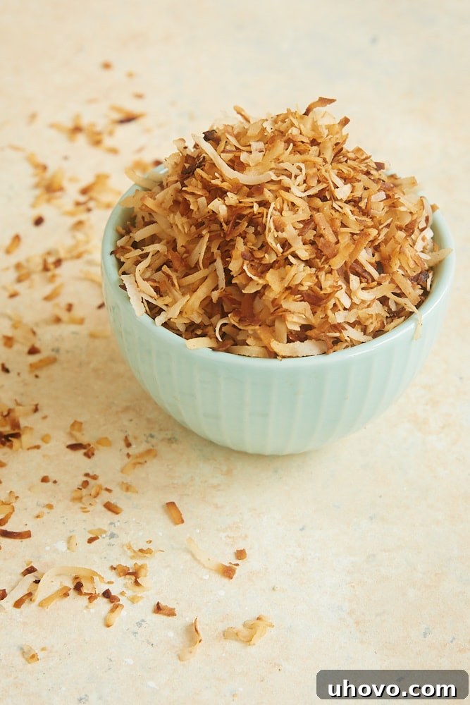 golden brown toasted coconut flakes ready for baking