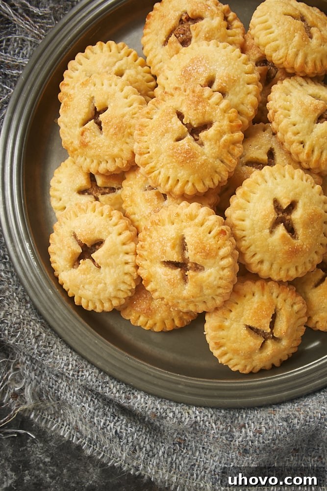 Pecan Hand Pies on a pewter plate, ready to be enjoyed.