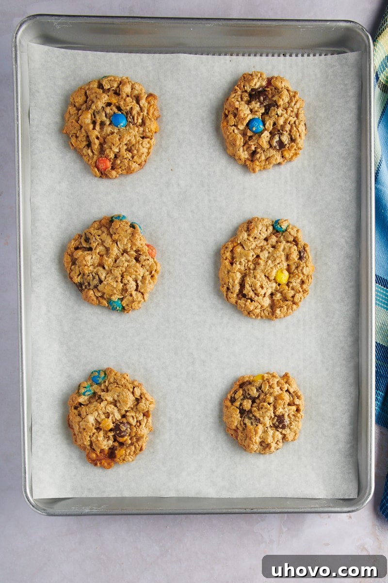 Overhead view of monster cookies on baking sheet