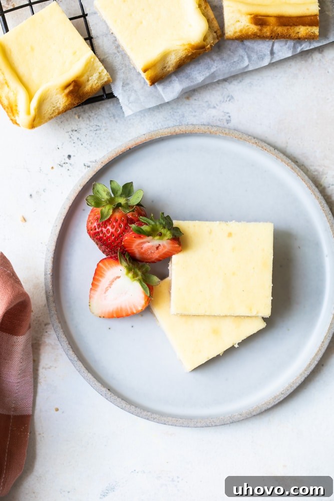 Vanilla Bean Cheesecake Bars on a white plate
