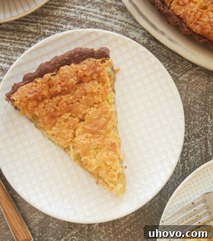 slices of Coconut Chess Pie with Chocolate Crust on white plates