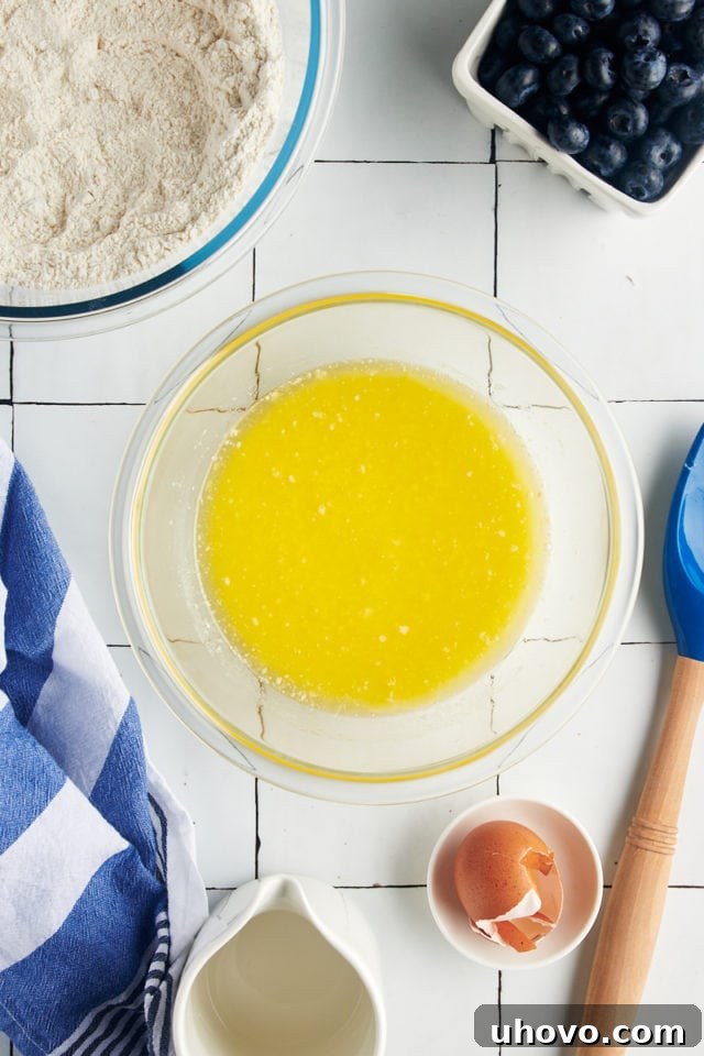 Wet ingredients whisked in a mixing bowl.