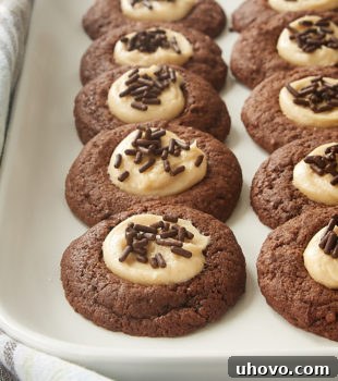 Chocolate Peanut Butter Thumbprint Cookies on a white tray