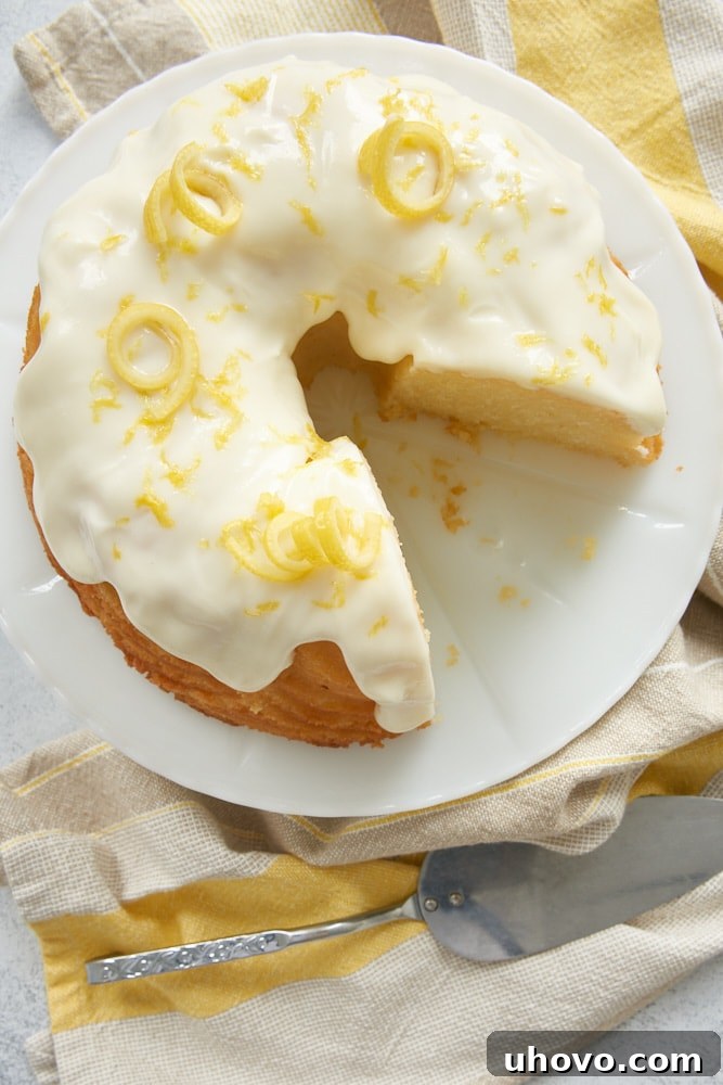 Lemon Bundt Cake topped with lemon curls and zest