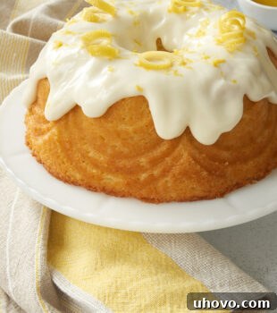 Lemon Bundt Cake on a white cake stand