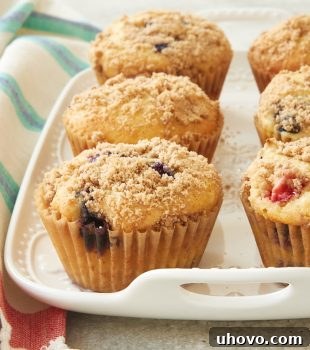 Berry Cheesecake Muffins on a white tray