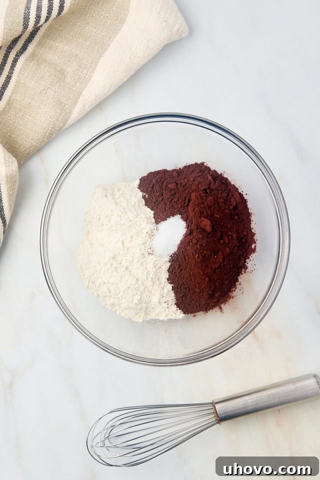 Dry ingredients for brownies in a bowl before whisking