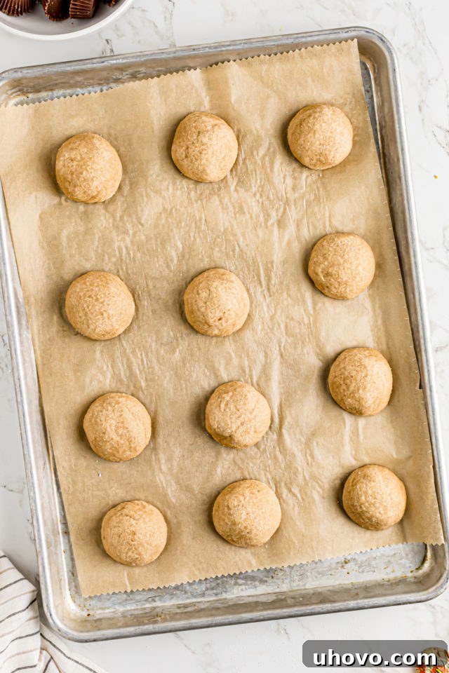 Pan of peanut butter cookie dough, halfway through baking