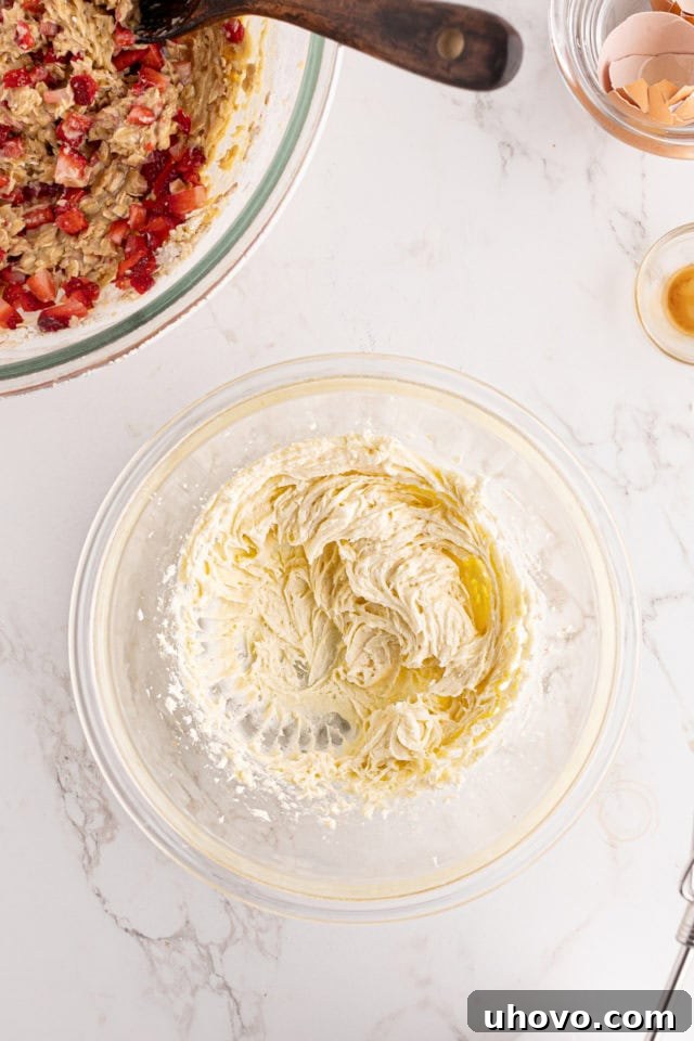 Overhead view of the creamy, smooth cream cheese mixture after being blended for the strawberry cream cheese bread swirl.