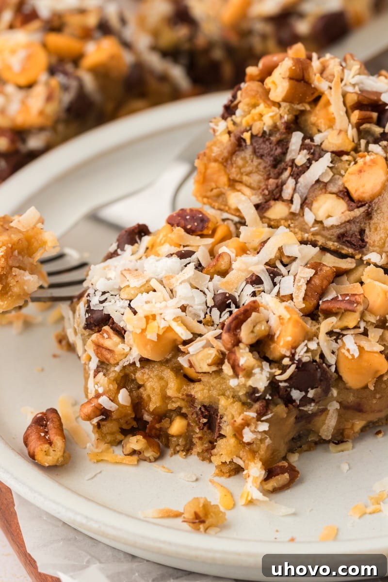Two irresistible toffee squares elegantly presented on a clean white plate, ready to be savored.