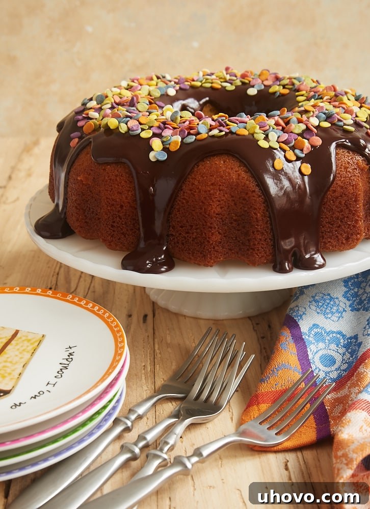 A classic Yellow Bundt Cake with a rich, dark chocolate ganache glaze.