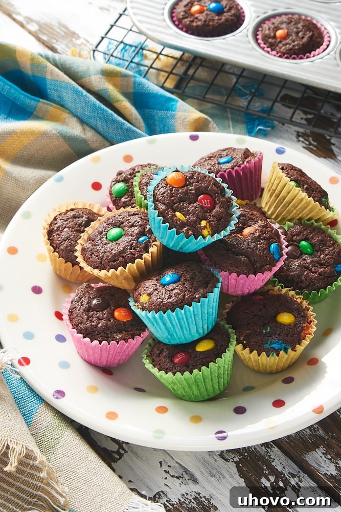 M&M Brownie Bites on a polka-dotted plate