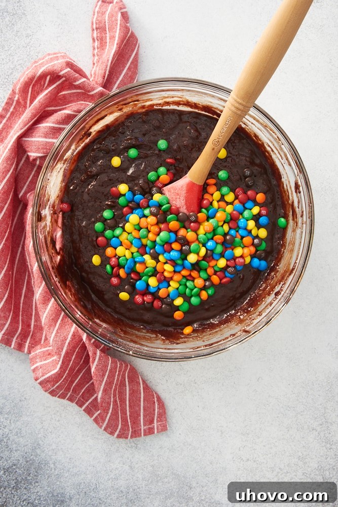 overhead view of the batter for M&M Brownie Bites