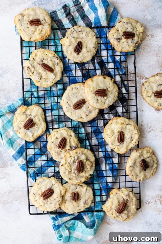 An overhead shot of freshly baked Potato Chip Cookies cooling on a wire rack, showing their golden color and rustic texture.