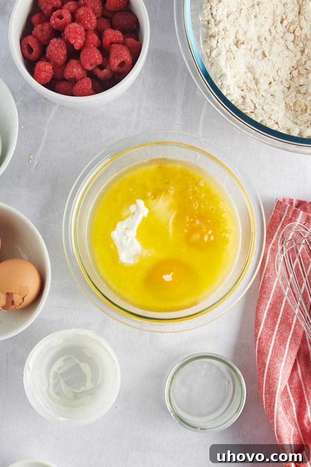 Wet ingredients (melted butter, brown sugar, granulated sugar, eggs, vanilla) in a separate bowl before mixing.