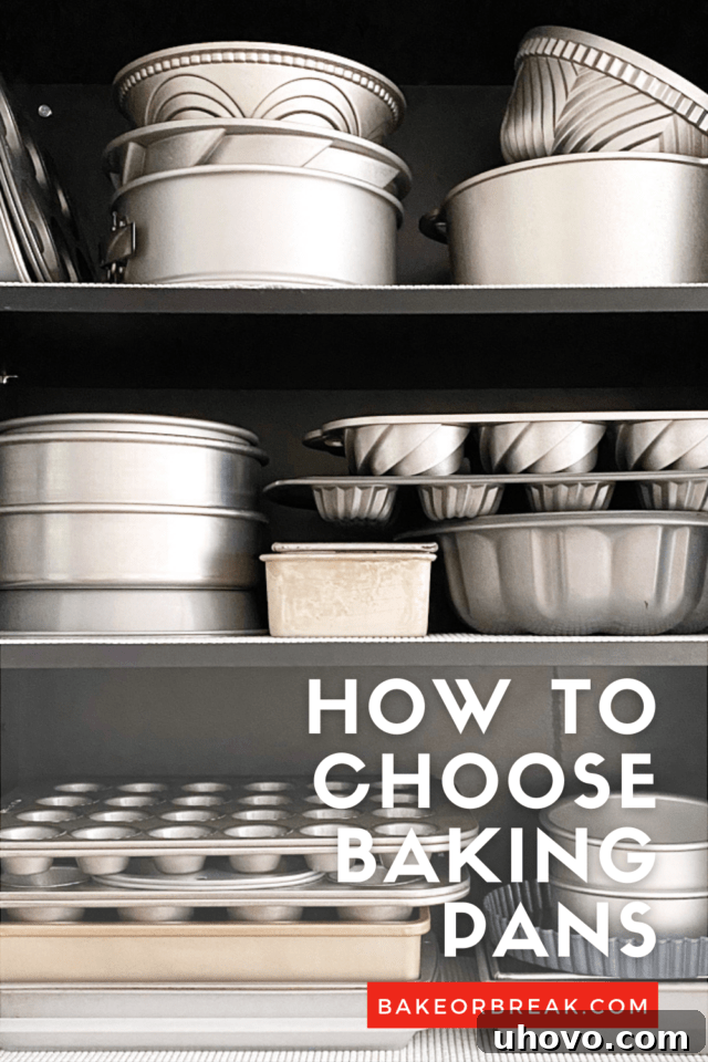 Selection of various baking pans including loaf pans, round cake pans, and cookie sheets for home baking